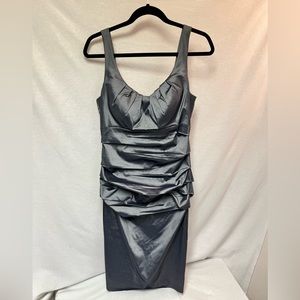 Dress by Melrose in a grey silver summer. Size 10. With zipper in back.